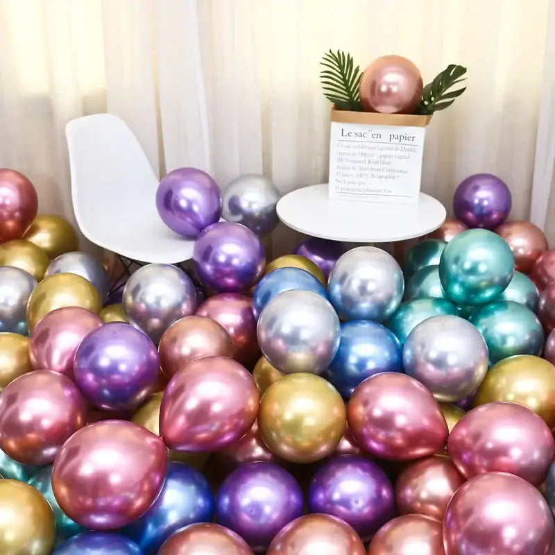 A vibrant metal latex confetti balloon set with shiny pastel and iridescent pink purple gold silver and teal balloons
