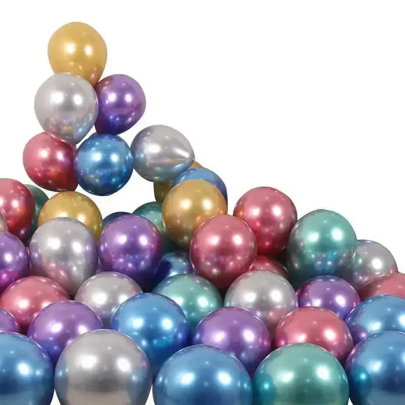 A pile of iridescent metallic latex confetti balloons in gold silver blue purple pink and teal for party decor