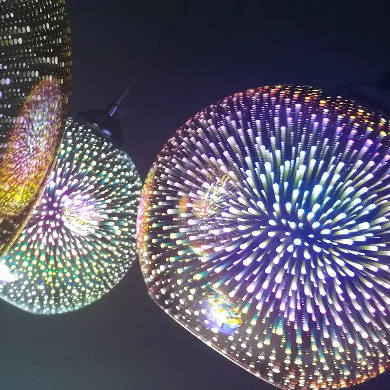 Vibrant multi-colored burst glass pendant light fixture with intricate perforated designs casting radiant patterns for living room