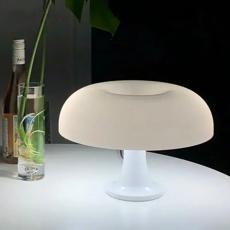 Cream-colored mushroom table lamp with smooth glossy white base vibrant orange night light mushroom for desk use