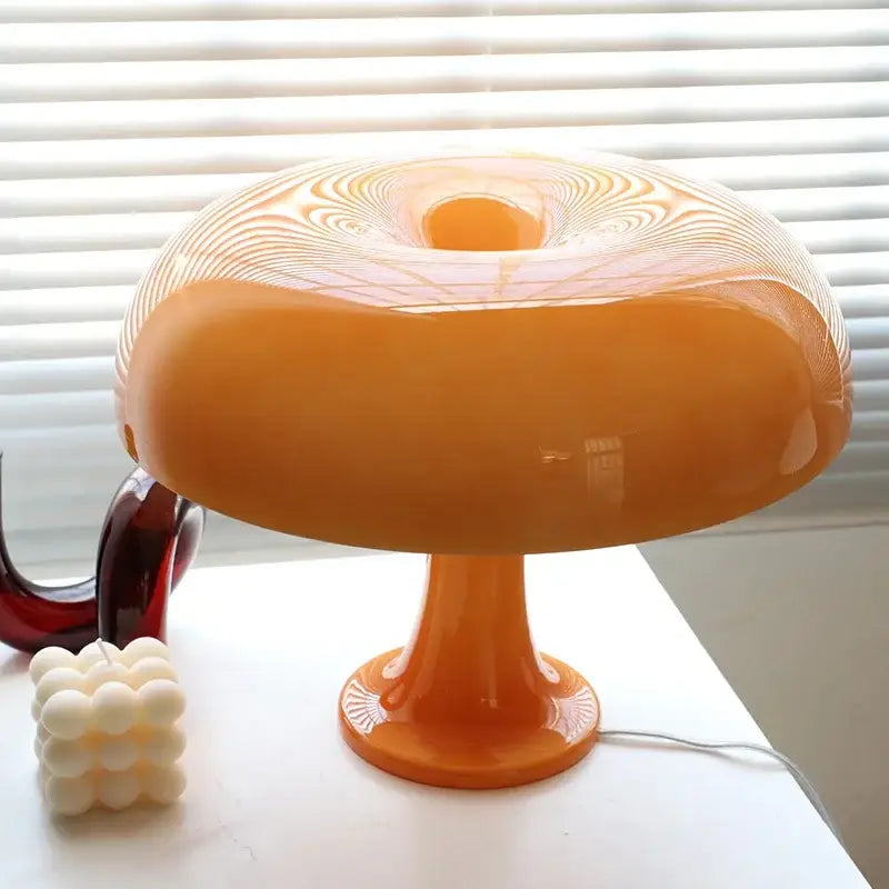 Vibrant orange mushroom desk night light with a glossy swirling glass shade ideal as a bedhead night light mushroom