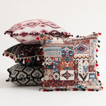 Vibrant patchwork ethnic boho throw pillow cover with geometric tribal patterns and colorful tassels for living room decorbites decor