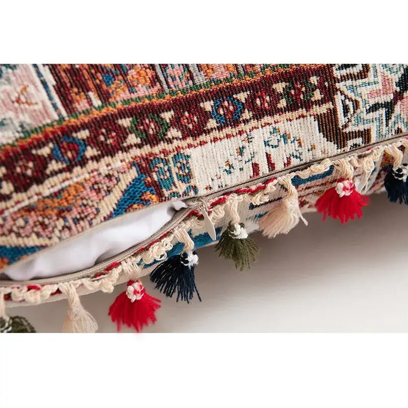 Decorbites ethnic boho pillow covers with intricate multicolored woven patterns and tassels for vibrant living room decor