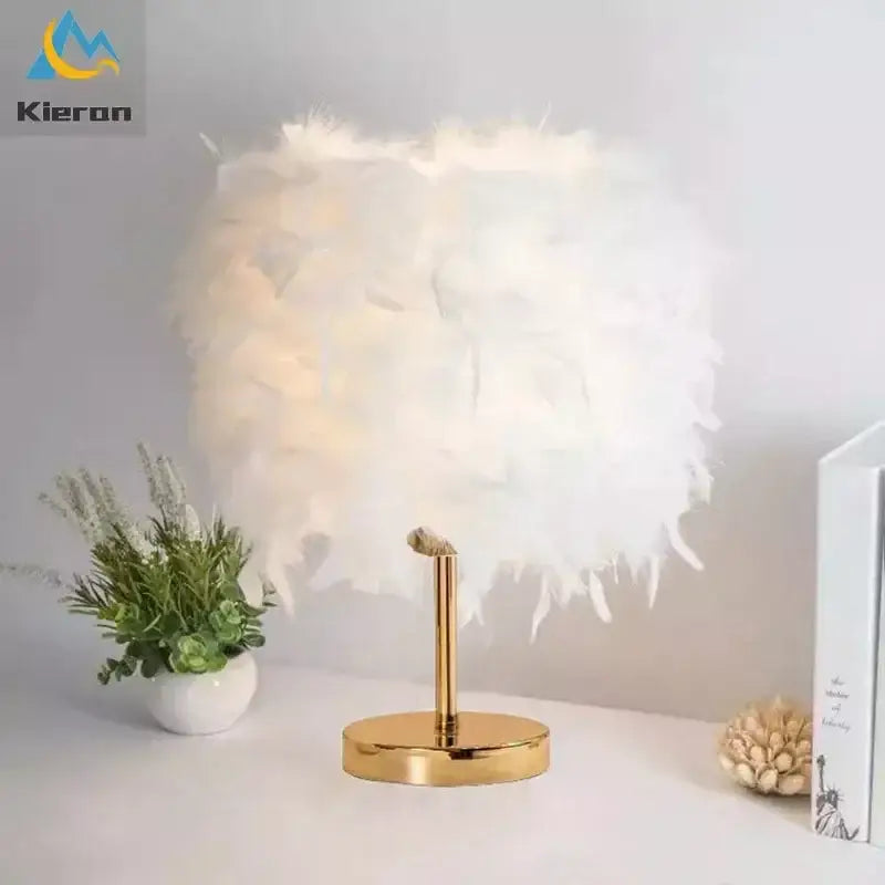 Vibrant pink crystal feather led table lamp with fluffy white feather lampshade and gold-toned metal base decorbites crystal feather