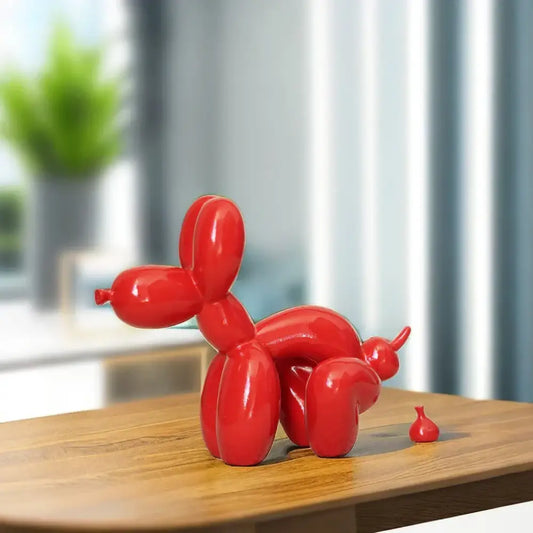 Vibrant red dog balloon poop resin sculpture with glossy finish on wooden surface for decorbites dog balloon decor