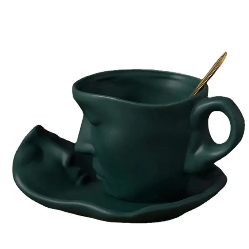Dark green ceramic mug set and saucer with serene human face design for decorbites frosted ceramic face collection