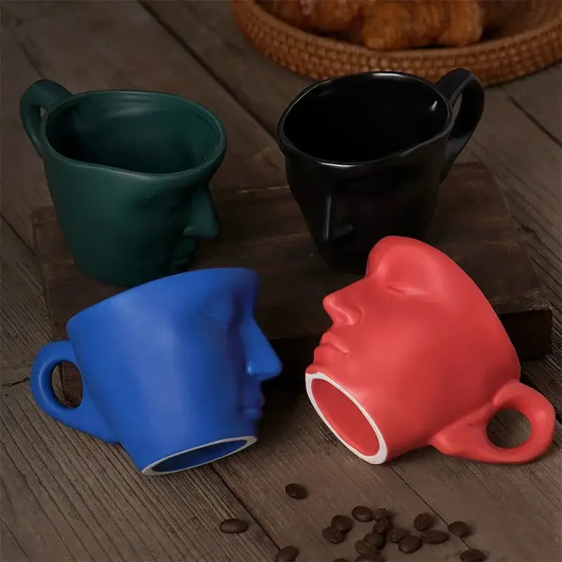 Four vibrant red teal black and blue decorbites frosted ceramic face mug set with smooth glossy finish for kitchen and dining room