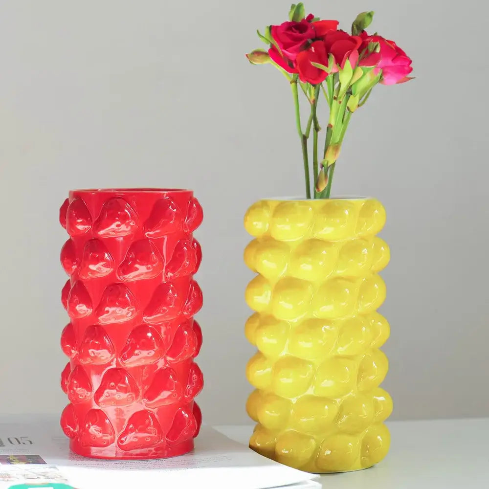 Vibrant red and yellow ceramic fruit relief vase with textured bumpy surface and glossy finish for decorbites fruit decor