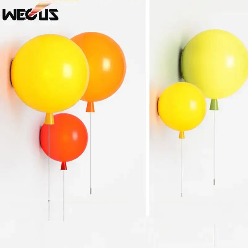Vibrant red orange and yellow balloon lamps wall light with glossy finish and matching stems for bedroom wall light