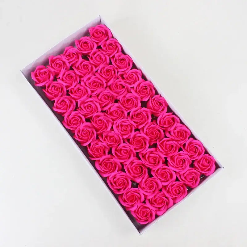 A box of vibrant pink rose-shaped soap bars in decorbites bath flower set for bathroom decor and relaxation