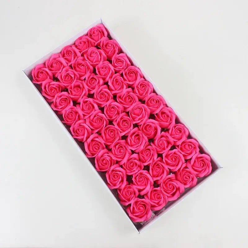 Bright pink rose-shaped soap bars arranged in white box from decorbites bath flower set bathroom decorbites bath
