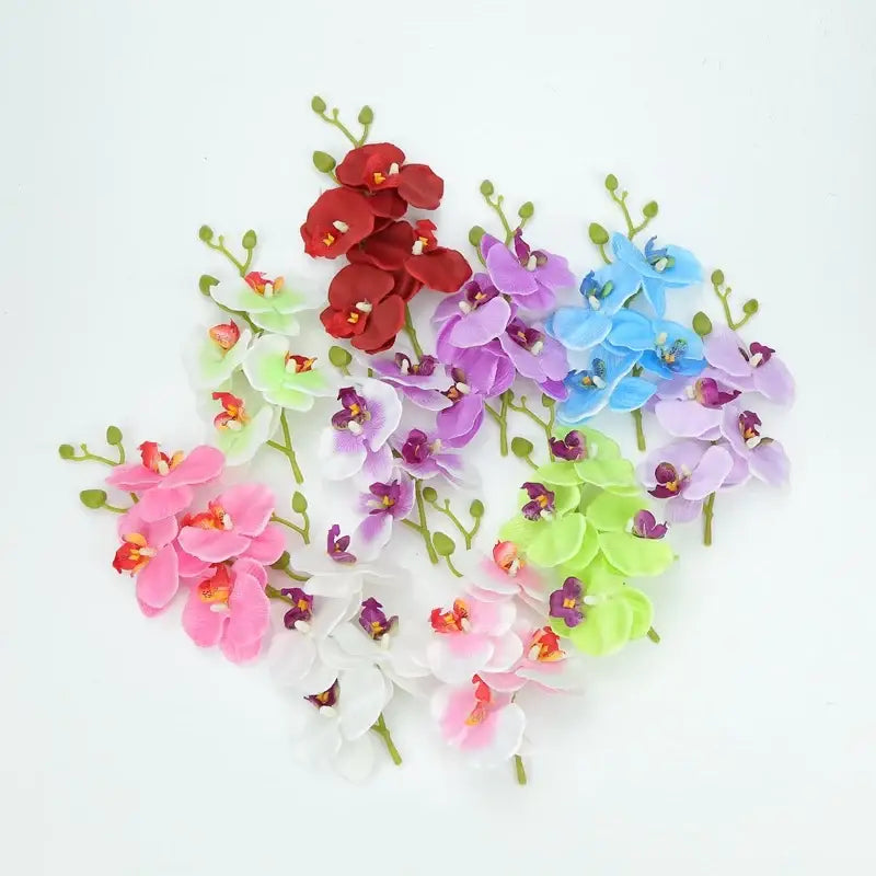 Vibrant silk butterfly orchid bouquet with red pink white purple blue and green artificial petals for wedding decor