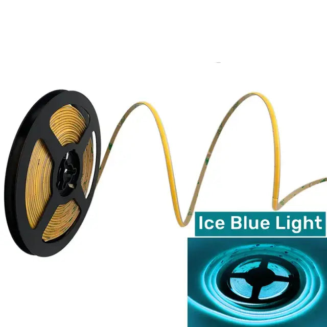 Vibrant slim 4mm cob led strip lights yellow with ice blue illumination coiled on black spool for bedroom lighting