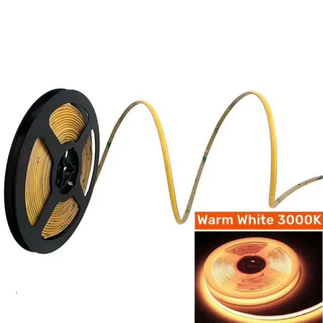 Vibrant slim 4mm cob led strip lights with warm white 3000k flexible yellowish-gold tubing on black spool