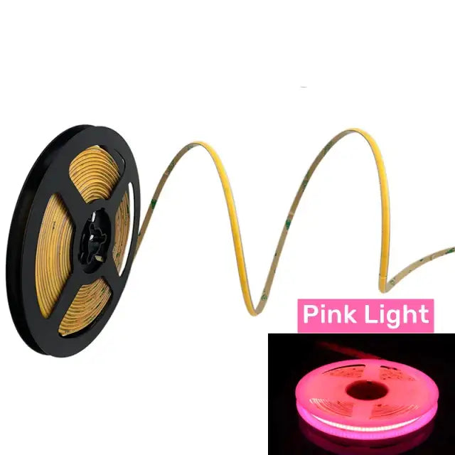 Vibrant slim 4mm cob pink led strip lights on a black spool with yellow flexible tubing ideal for bedroom linear tape lighting