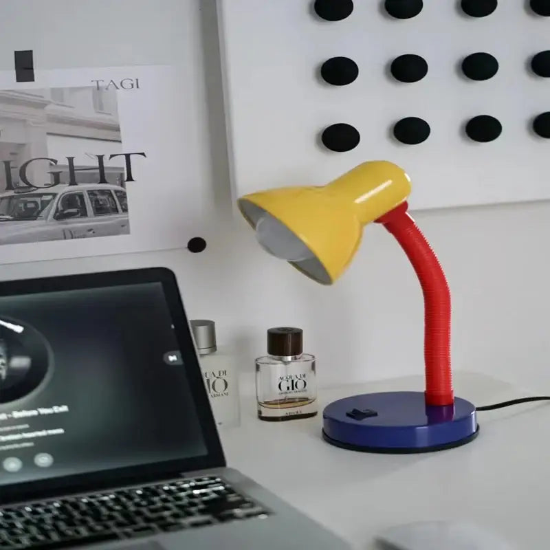 Vibrant yellow and red decorbites led study desk lamp with blue base designed for eye protection in bedroom use