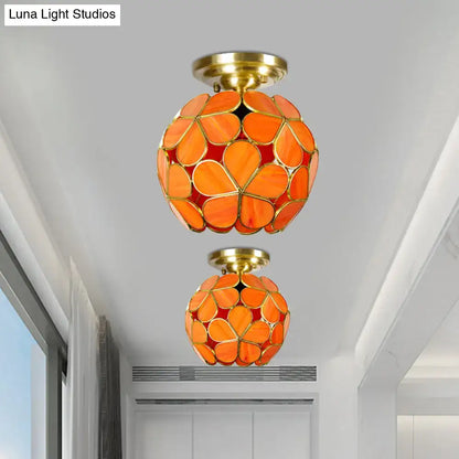 DecorBites Victorian stained glass flower ceiling fixture with orange floral design and brass accents in semi-mount style