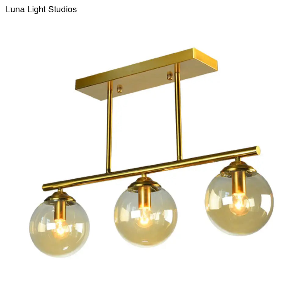 Vintage 3-Bulb Glass Pendant Lamp in Sphere Clear/Amber with Gold Hanging Fixture for Island Lighting