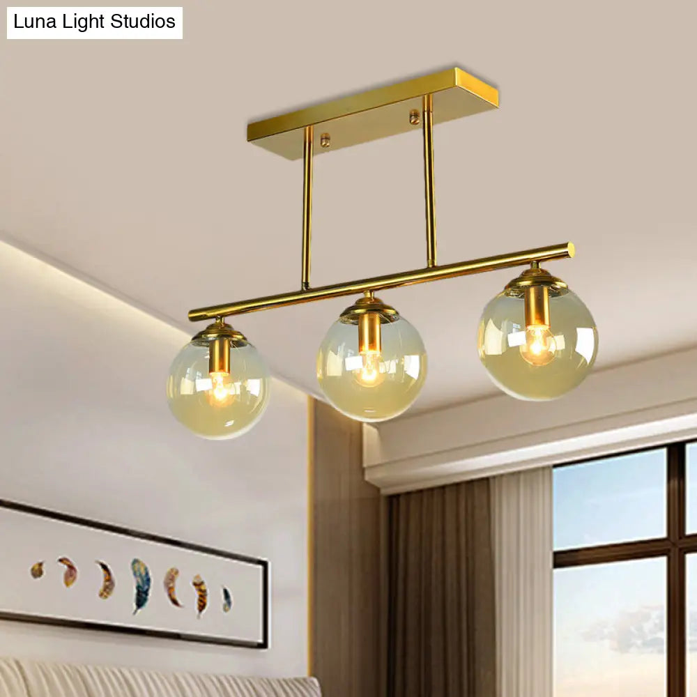Vintage 3-Bulb Glass Pendant Lamp in Sphere Clear/Amber with Gold Hanging Fixture for Island Lighting