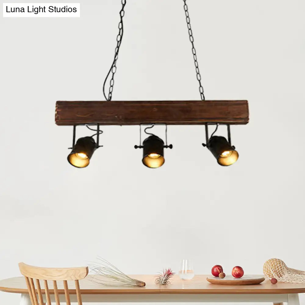 Vintage 3-Headed Metal Island Pendant Light with Black Barrel Shade: Restaurant Lighting on Linear Wooden Beam