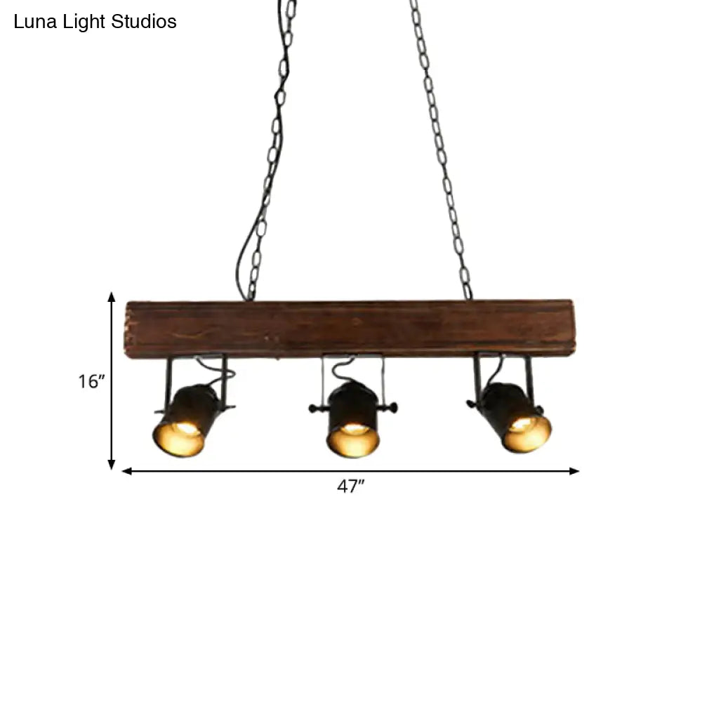 Vintage 3-Headed Metal Island Pendant Light with Black Barrel Shade: Restaurant Lighting on Linear Wooden Beam