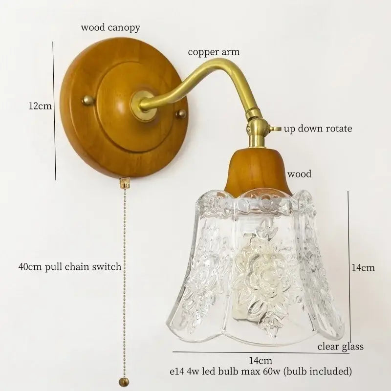 Vintage amber cracked glass led wall lights featuring a clear floral etched bell-shaped lampshade on brass wood sconce