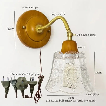 Vintage amber cracked glass led wall lights with brass copper arm, warm wood canopy, and floral etched glass shade by decorbites
