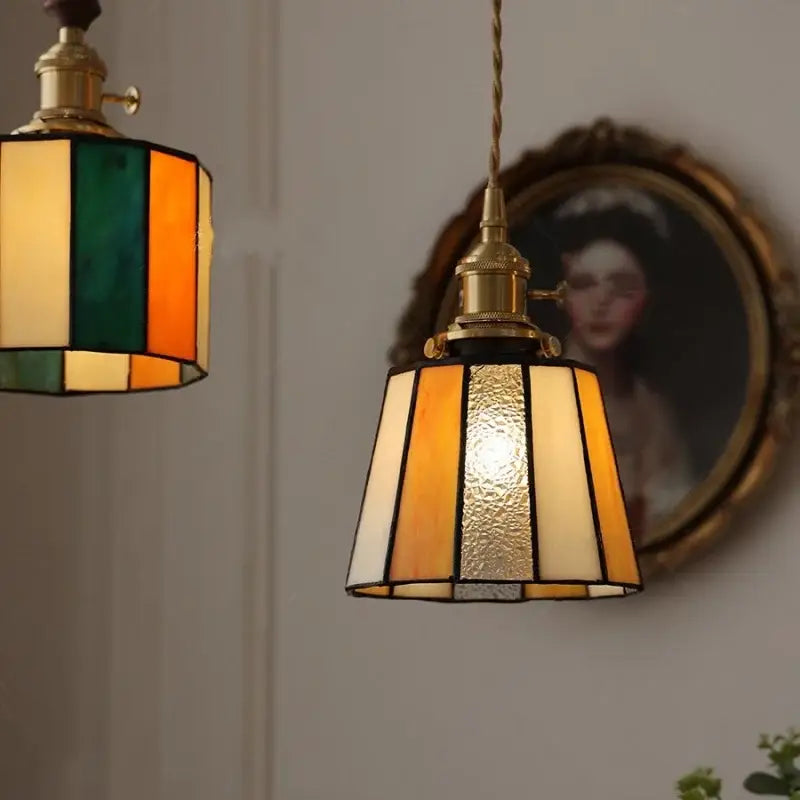 Vintage amber and cream stained glass pendant lamp with brass fixture and decorbites copper knob switch for dining room