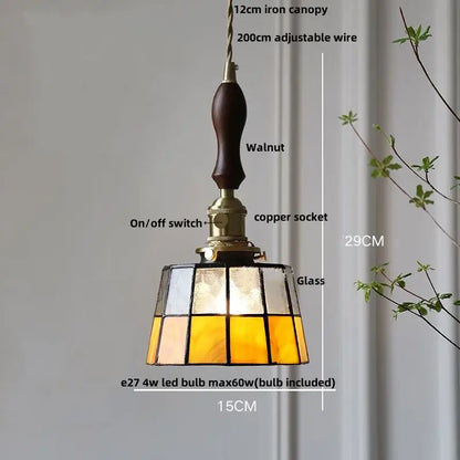 Vintage amber and cream stained glass pendant lamp with dark walnut handle brass accents and decorbites copper knob switch