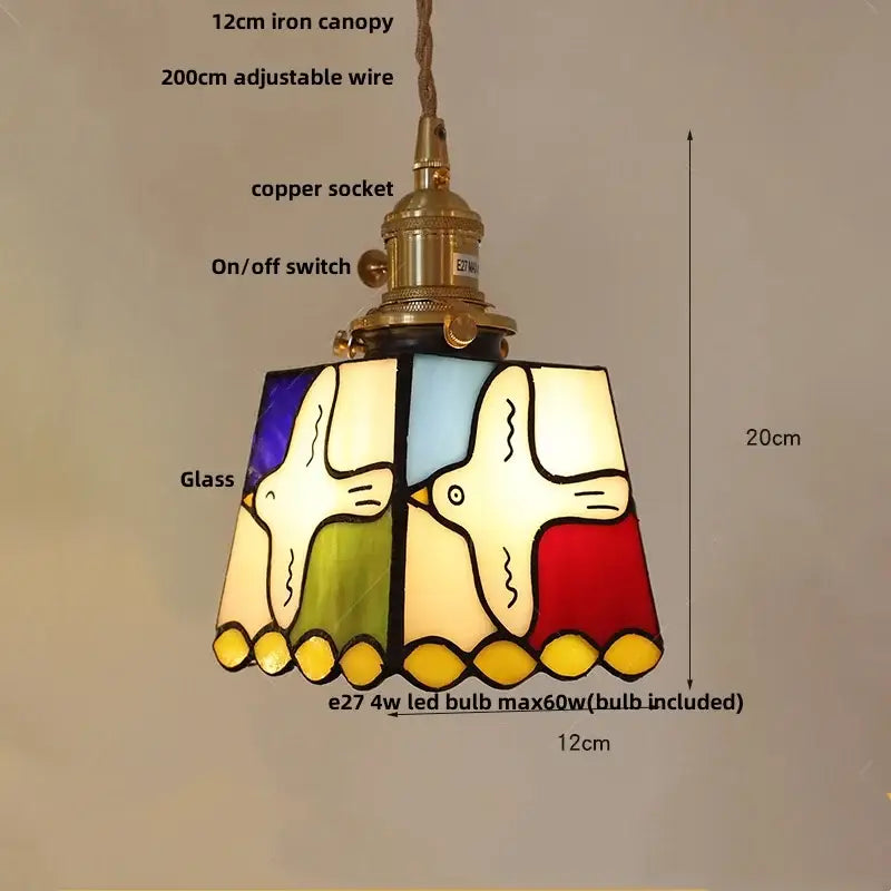 Vintage amber and cream stained glass pendant lamp with knob switch featuring colorful birds and decorbites copper knob