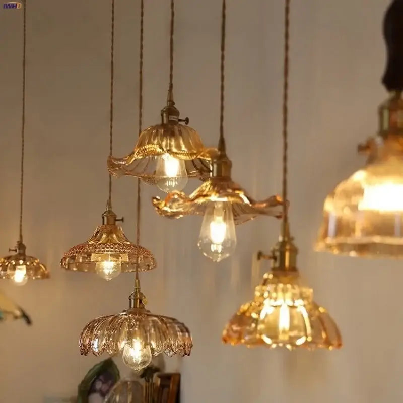 Golden vintage amber flower glass pendant lamp with intricate petal design and brass fixtures for dining room lighting