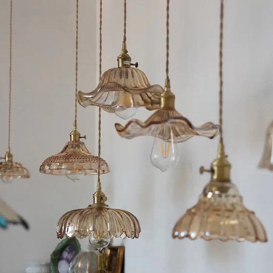 Delicate vintage amber flower glass pendant lamp with brass fixtures and woven cord suspension for dining room lighting