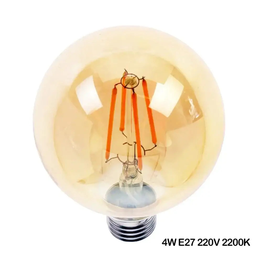 Warm amber-colored decorbites g125 led filament bulb with clear glass globe and visible orange filament threads for living room decor