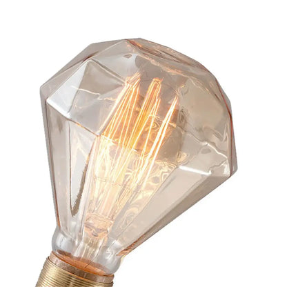 A clear faceted g95 diamond led spiral bulb with warm amber filament and brass base for living room decorbites g95 diamond