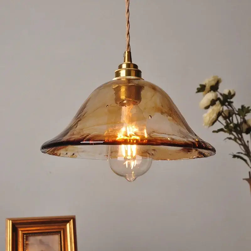 Vintage amber glass adjustable pendant light with warm amber glass and brass finish for dining room lighting