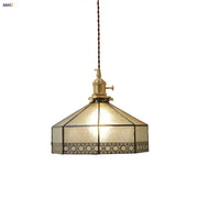 Vintage amber glass led pendant light with textured stained glass shade featuring geometric patterns for dining room