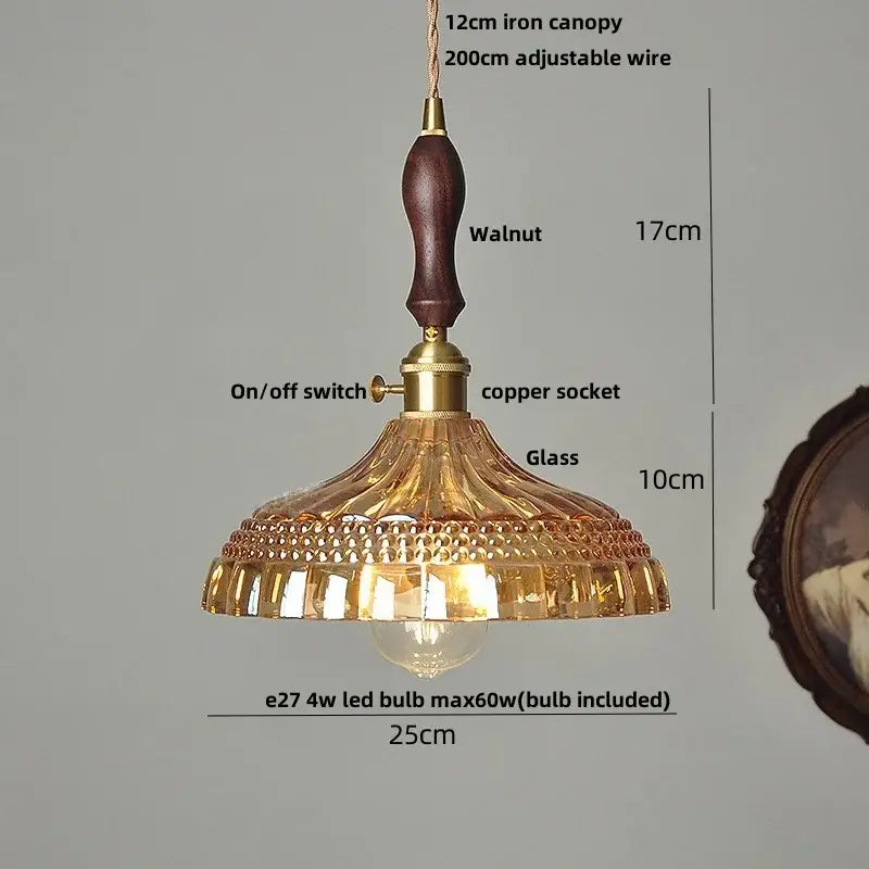 Vintage amber glass led pendant light with dark walnut wooden handle brass hardware and ornate amber decorbites amber glass shade