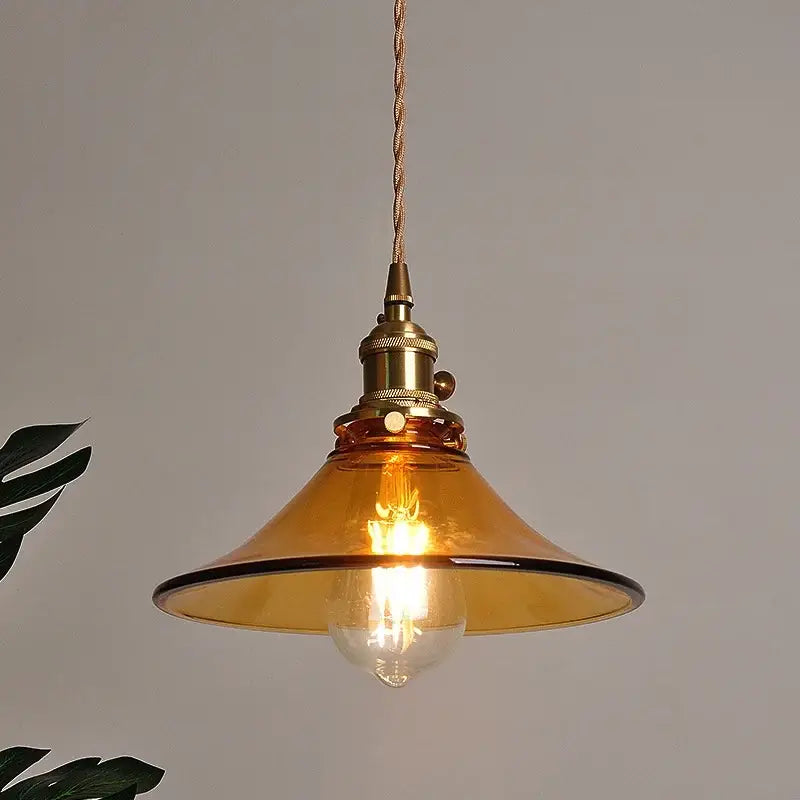 Vintage amber glass led pendant light with brass fixture and twisted copper cord by decorbites amber glass for kitchen decor