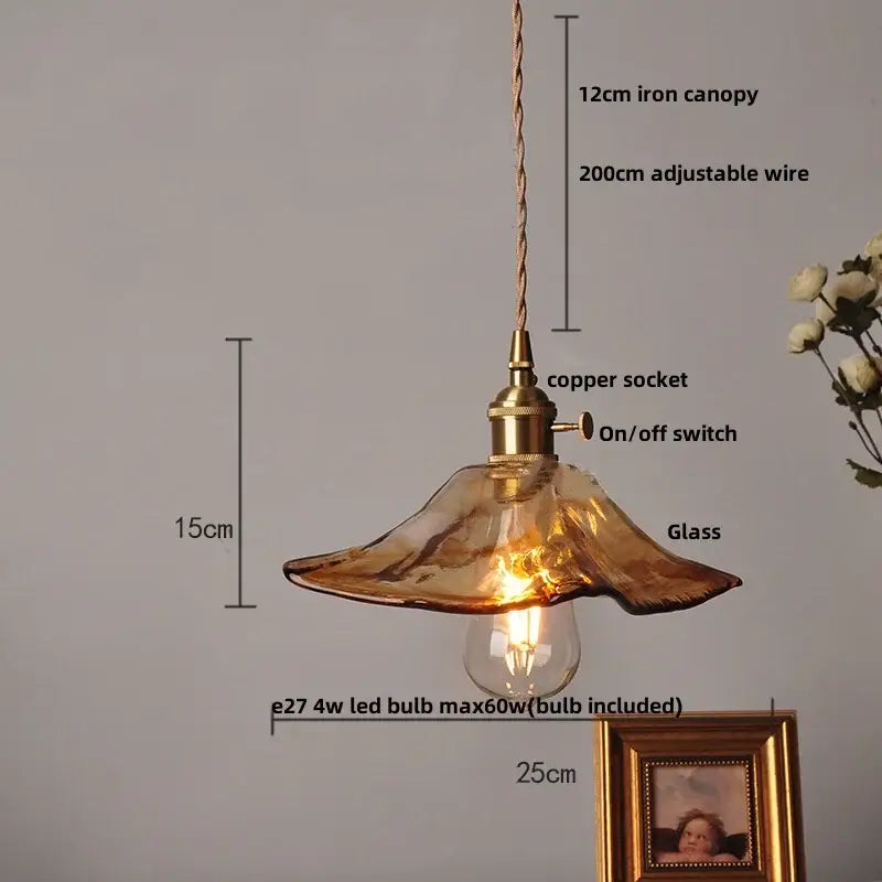 Vintage amber glass led pendant light with warm amber glass shade, brass copper socket, and twisted iron canopy decorbites amber glass
