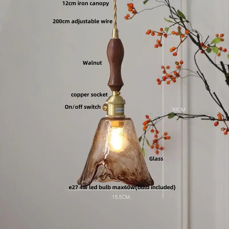 Vintage amber glass led pendant light with warm amber decorbites amber glass, walnut handle, and brass accents