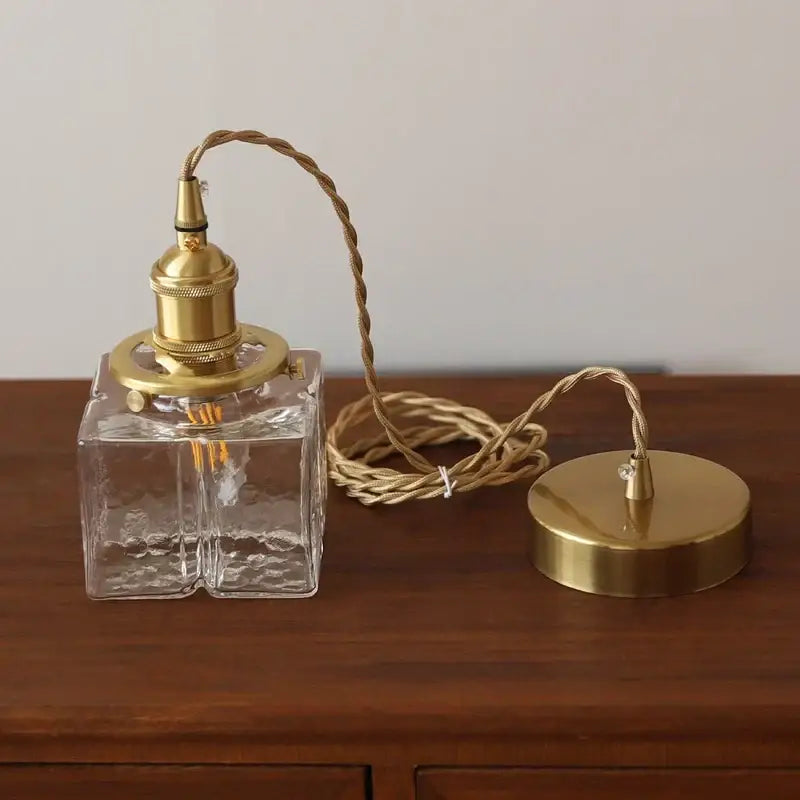 Clear glass square glass pendant light with brass fittings and twisted cord for vintage amber pendant light use