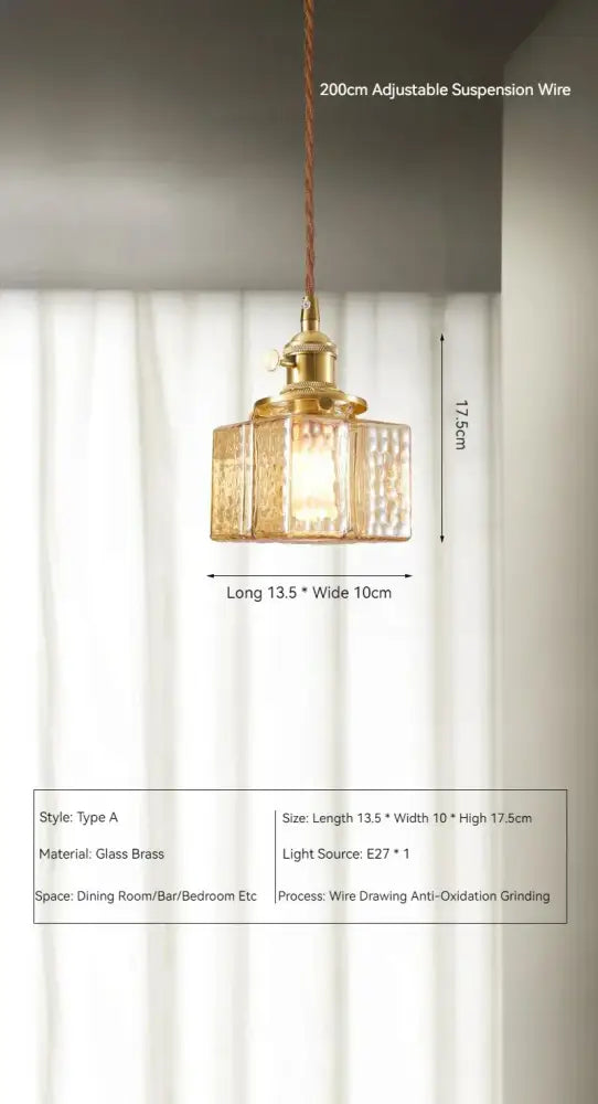 Vintage amber glass pendant light with golden brass frame, textured panels, and 20cm adjustable suspension wire for dining room
