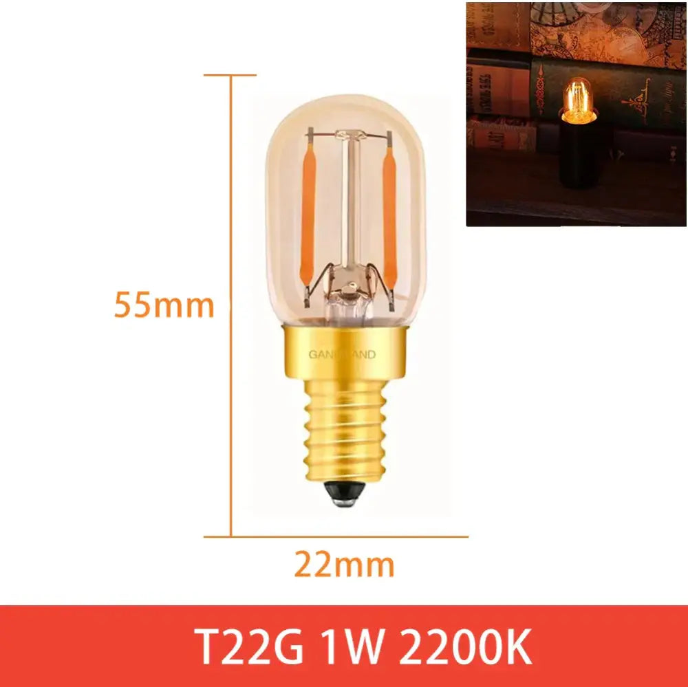 A warm amber t22g led bulb with gold screw base and clear glass for vintage home decor and decorbites dimmable led use