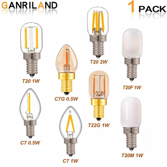 Vintage amber led bulb with brass and silver bases featuring warm glowing filaments for home decor and decorbites dimmable led use