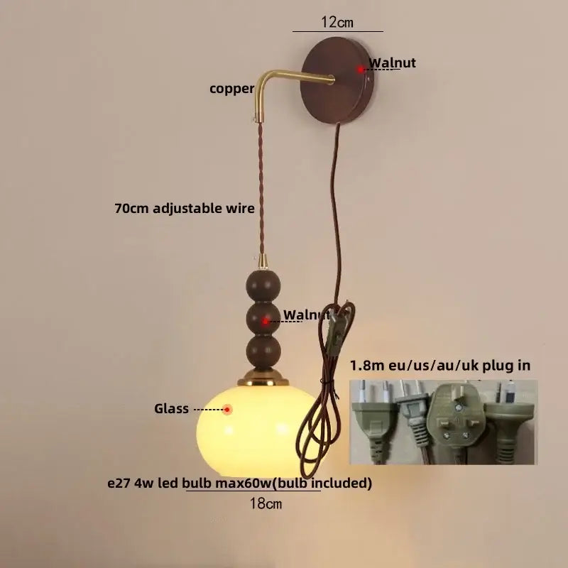 Vintage amber stained glass adjustable led wall lamp with warm-toned globe pendant and copper-finished mount decorbites adjustable led wall lamp