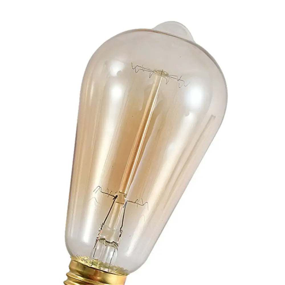 Clear glass edison bulb with brass base and visible filament featuring decorbites amber warm led spiral design for living room decor