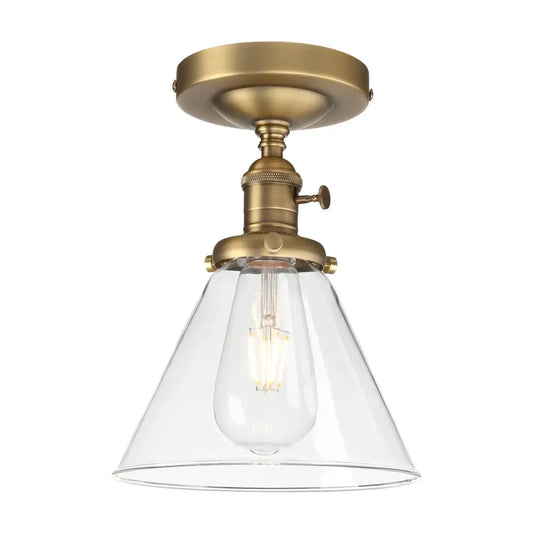 Antique brass finish vintage wall sconce with clear funnel glass shade and exposed filament bulb for bedroom decorbites funnel glass wall