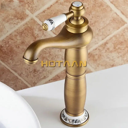 Vintage antique brass single hole bathroom faucet with cold water housing material and floral ceramic knob detailing