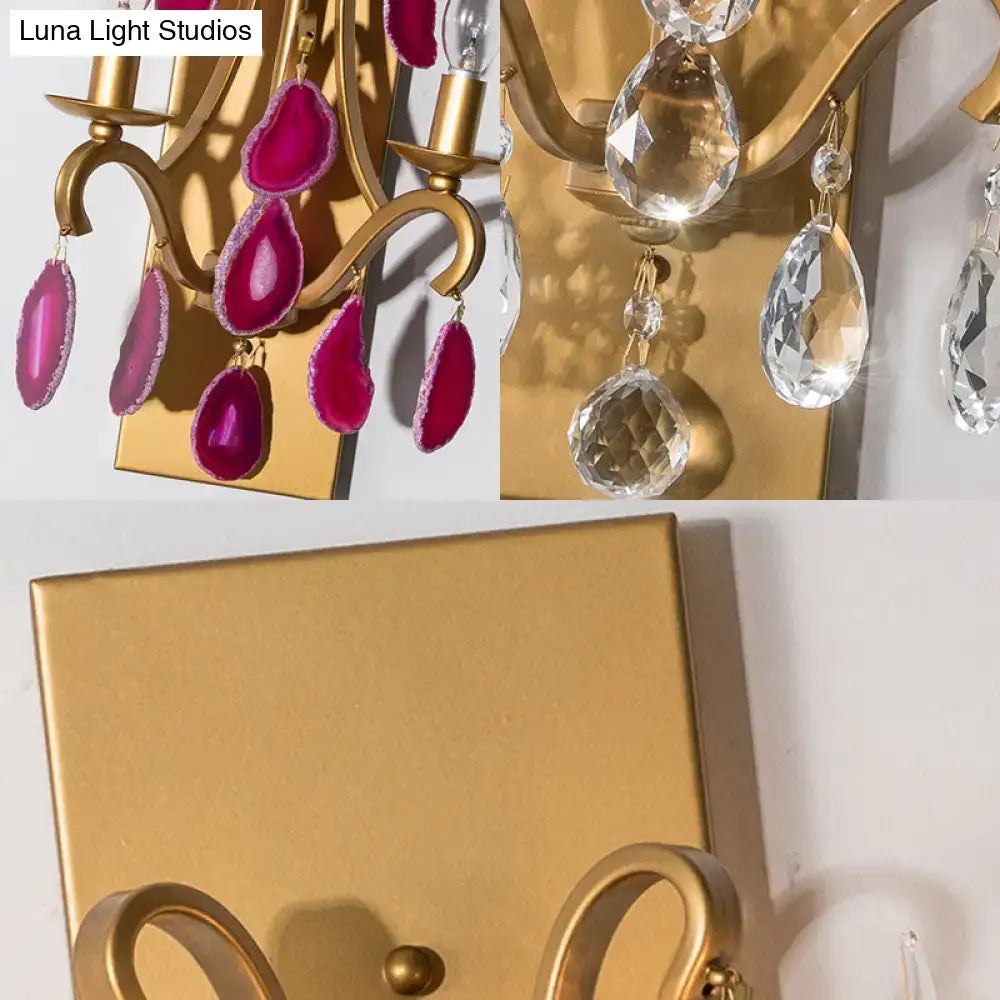 Gold-finished vintage wall lamp sconce with dark purple fuchsia geode slices and clear faceted crystal teardrops