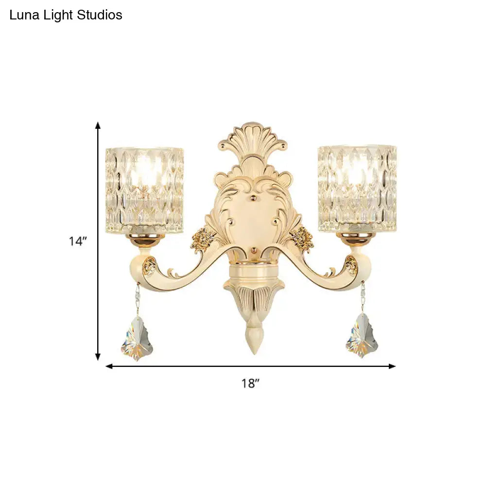 Vintage beige and gold glass wall light with crystal-encrusted shades and faceted pendants for bedroom use